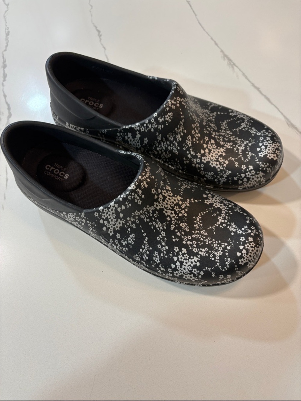 CROCS Black Slip-On Clogs with White Floral Speckle